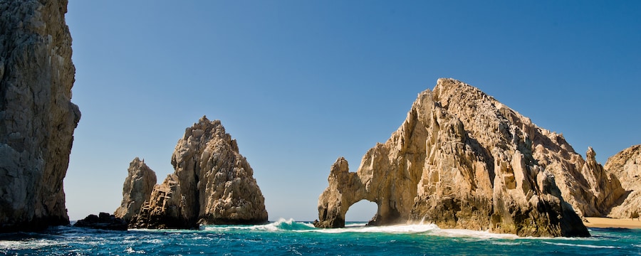 Giant, jagged boulders in the ocean form their own tiny islands